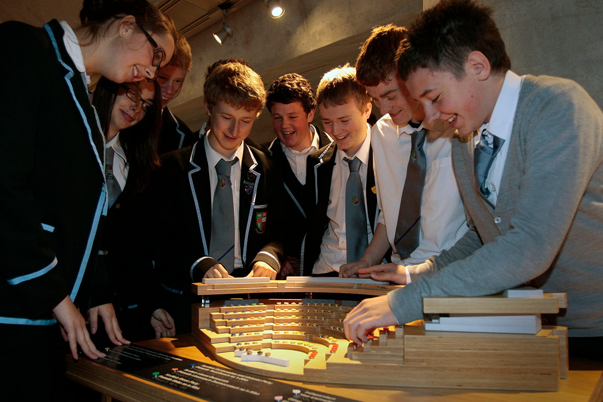 School pupils exploring a model of the Scottish Parliament in the Main Hall