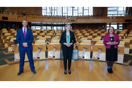 Presiding Officer Alison Johnstone with Deputy Presiding Officers Liam McArthur and Annabelle Ewing on the floor of the Debating Chamber
