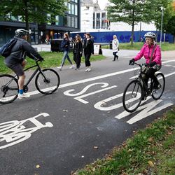 People cycling in the Meadows